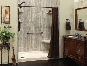 A beautiful modern bathroom with a walk-in shower and dark wood vanity