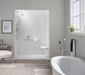 Picture of a beautiful new white shower in a gray bathroom.