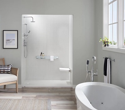 A modern bathroom with a Roman walk-in shower and a standalone deep-soaking tub.